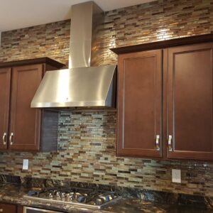 Professional tile backsplash installation for kitchens, up to specified square footage.